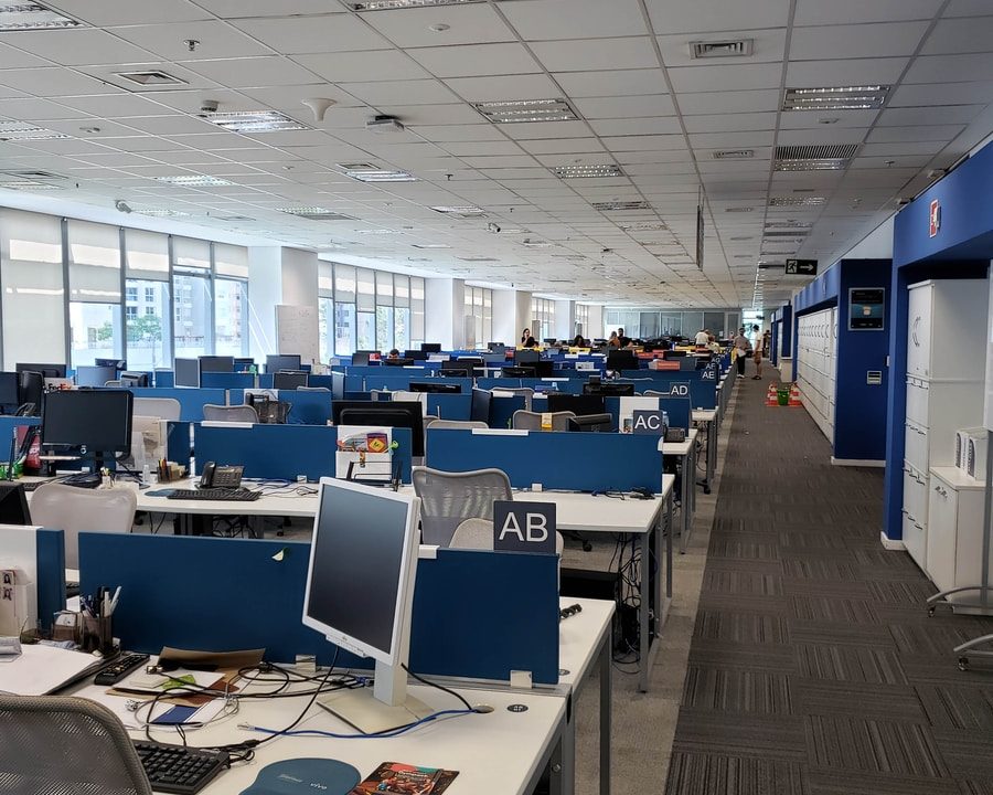 white and blue office rolling chairs